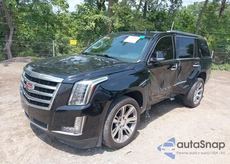 2015 Cadillac Escalade Premium z USA, uszkodzony, nr VIN 1GYS4NKJ4FR631087